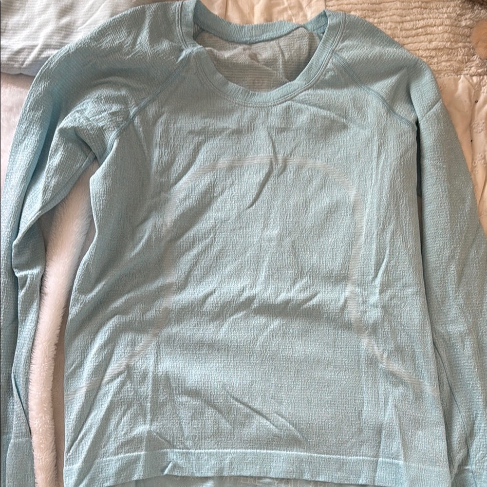 Lululemon glitter textured light blue 
Worn once